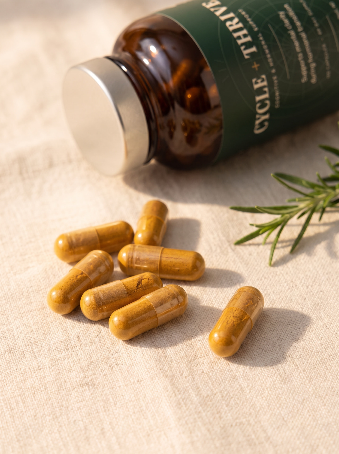 Cycle + Thrive amber glass bottle with forest green label